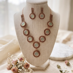 Manadh Jewels premium sky blue stone necklace set with matching earrings featuring an antique gold finish, lightweight design, tarnish-resistant craftsmanship, and elegant round blue stones for festive and wedding wear