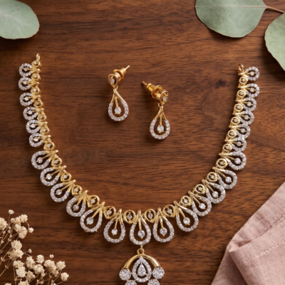 Gold Plated American Diamond Necklace Set by Manadh Jewels featuring sparkling teardrop-shaped CZ stones, matching drop earrings, elegant bridal design, and premium craftsmanship for weddings, receptions, parties, and festive occasions