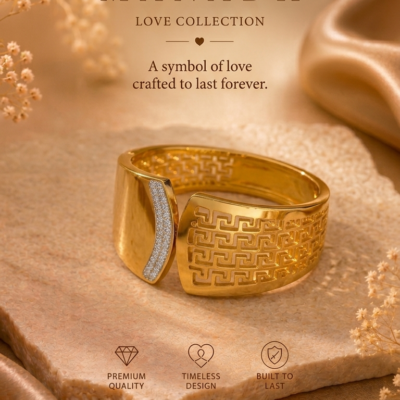 Gold-tone geometric open cuff bangle with patterned detailing and sparkling accent panel