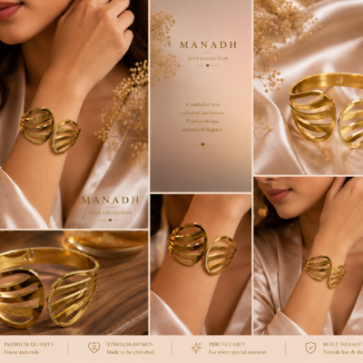Gold-tone open cuff bangle with flowing layered bands and sparkling crystal accent detailing