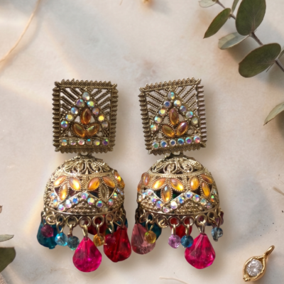 Pink stone oxidized statement earrings featuring crystal embellishments and dangling pink bead drops by Manadh Jewels for festive, wedding, and traditional ethnic wear