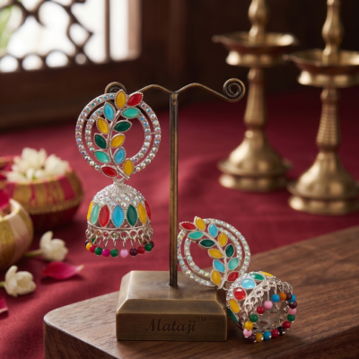 Premium multicolor oxidized jhumka earrings featuring colorful stone embellishments, intricate silver detailing, and decorative hanging beads displayed by Manadh Jewels