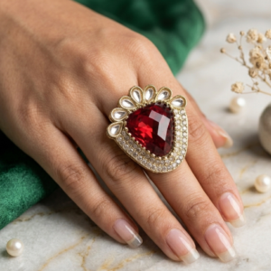 Red gemstone statement jewellery with intricate gold-tone detailing