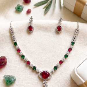 MANADH JEWELS ruby and emerald necklace set with matching earrings in silver-tone finish