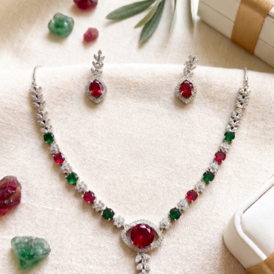 MANADH JEWELS ruby and emerald necklace set with matching earrings in silver-tone finish
