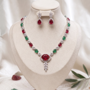 MANADH JEWELS ruby and emerald necklace set with matching earrings in silver-tone finish