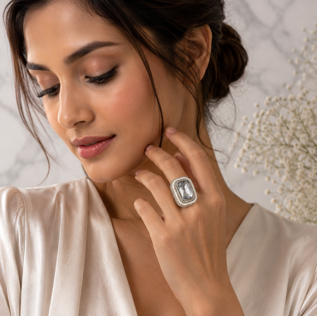 Silver Crystal Statement Ring 2 Silver statement ring by Manadh Jewels featuring a large emerald-cut clear crystal in a vintage-inspired rectangular setting, displayed in front, side, back, and angle 360-degree views.
