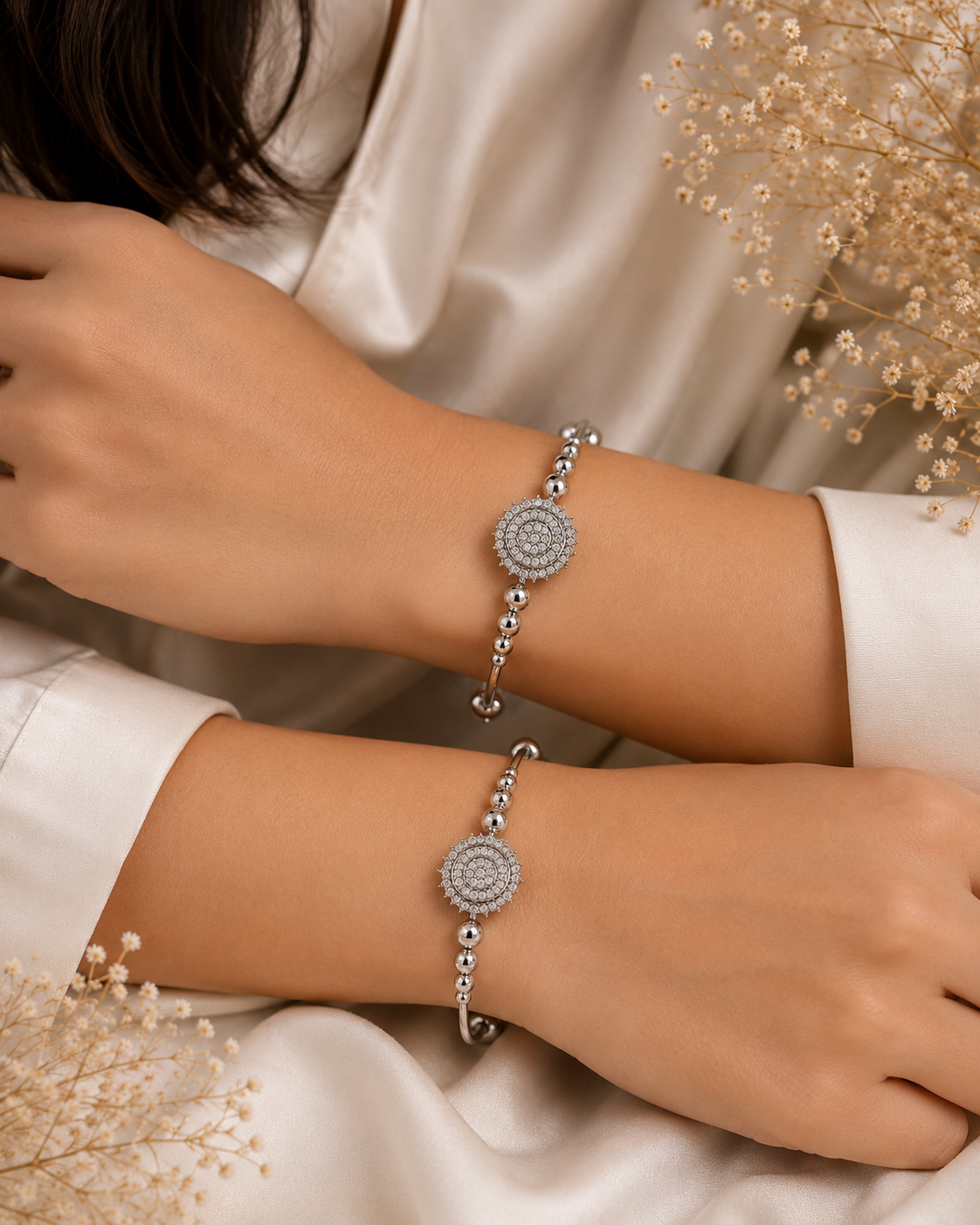 Sliver Floral Kada MND-BR011 Slide2 Silver-toned designer bangle set with intricate circular motifs and polished bead detailing