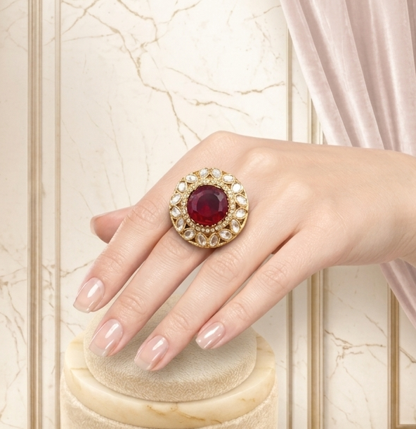 – Premium Red Gold-Tone Cocktail Ring 3 Luxury ruby statement ring by Manadh Jewels featuring a vibrant ruby-red center stone surrounded by sparkling halo accents in a premium gold-tone setting, displayed in 360-degree front, side, back, and angle views.