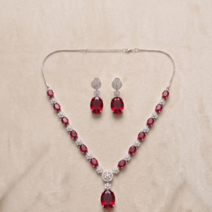 Manadh Jewels Ruby Red Crystal Necklace Set with Matching Earrings featuring premium ruby-red stones and sparkling crystal accents, ideal for weddings, parties, festive occasions, and bridal wear