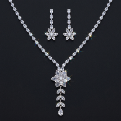 Lightweight silver crystal latkan necklace set on clear card packaging with adjustable link chain