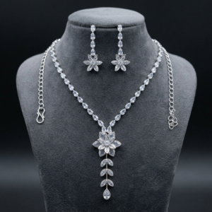 Lightweight silver crystal latkan necklace set on clear card packaging with adjustable link chain