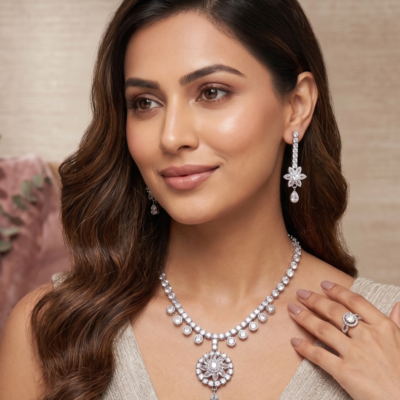 Elegant silver crystal floral necklace set with matching drop earrings