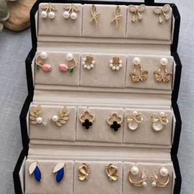 Gold earrings set for women with pearl, floral and butterfly designs