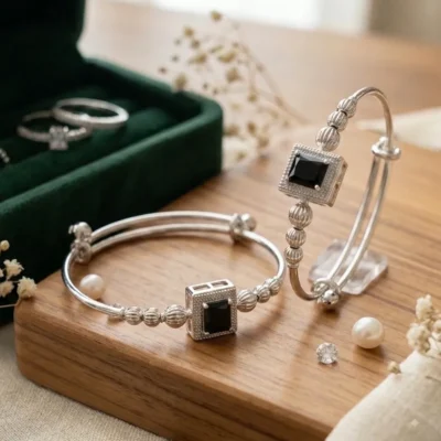 Designer silver bangle jewelry with black gemstone for women