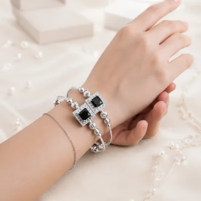 Designer silver bangle jewelry with black gemstone for women