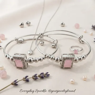 Silver adjustable kada bracelet with pink square gemstone and decorative silver beads